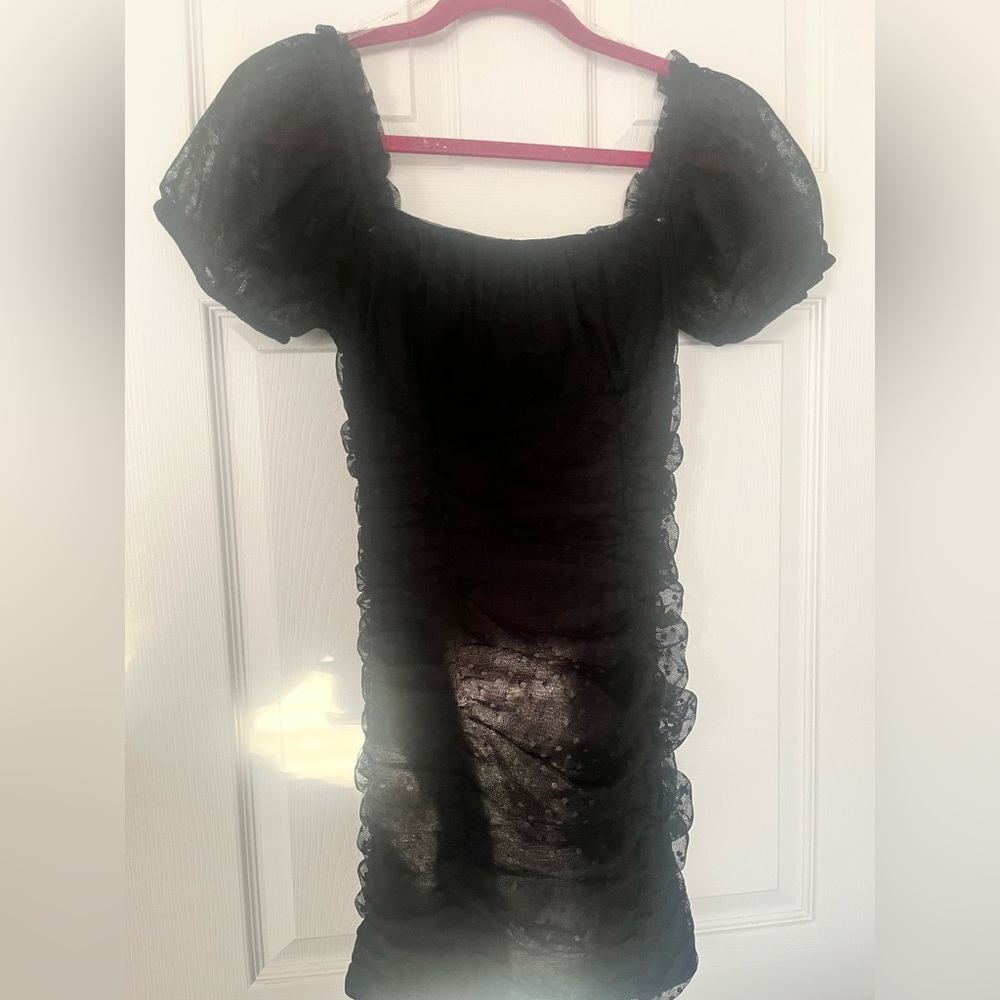 Black body con mini dress.